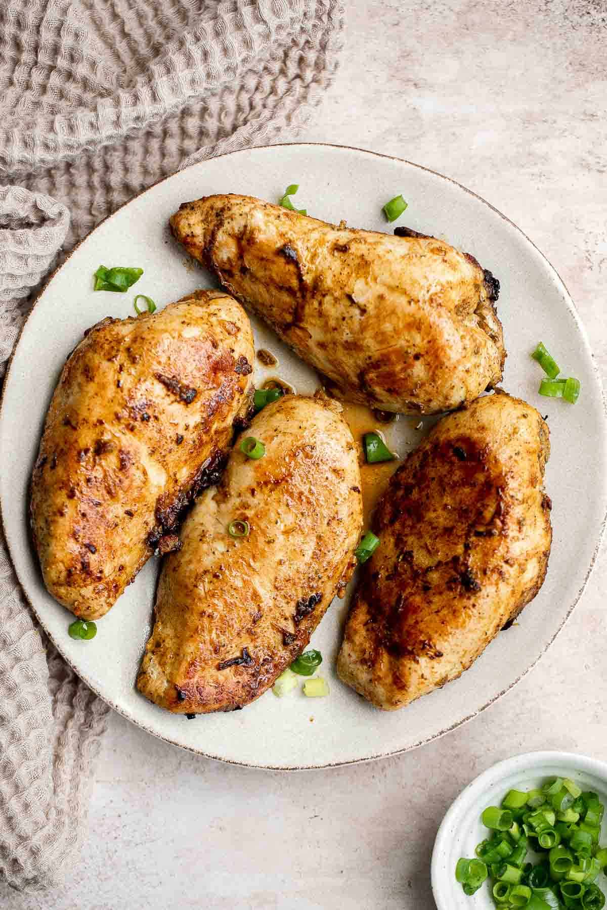 Mexican chicken breast is juicy, tender, and flavorful. It's easy to prep with a quick marinade before cooking on the stove, air fryer, or oven. | aheadofthyme.com