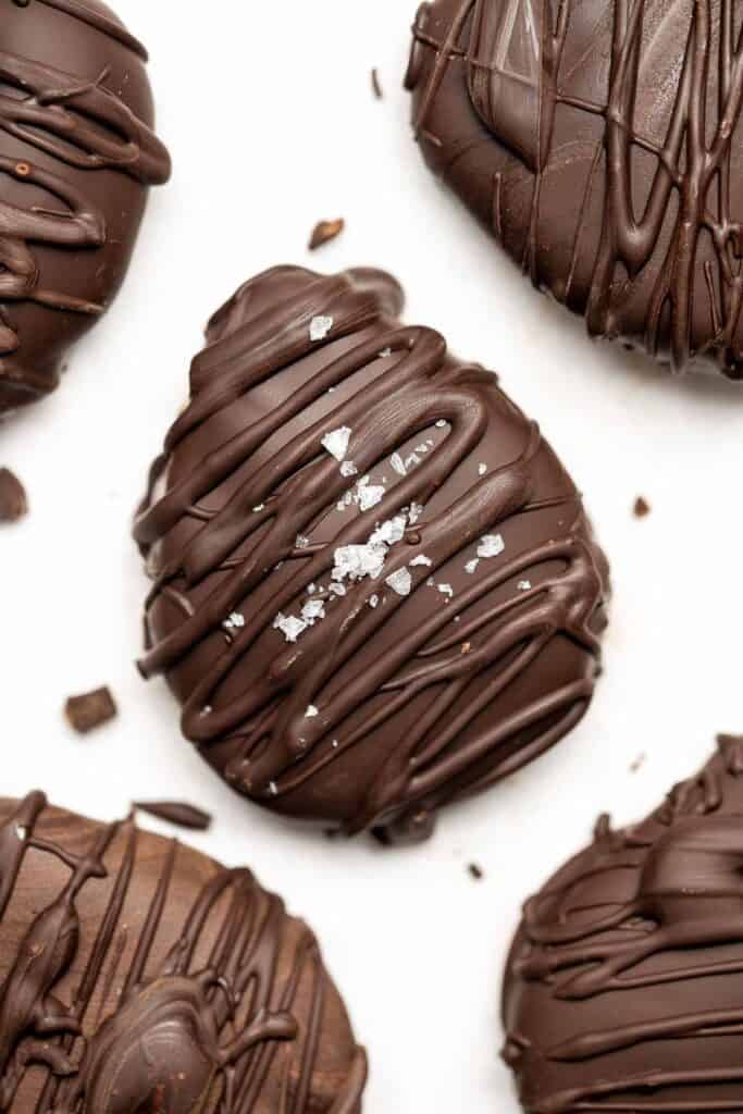 Chocolate-covered peanut butter eggs with a hard chocolate shell on the outside and a soft peanut butter interior inside are rich, sweet, and delicious. | aheadofthyme.com