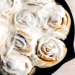 Soft and fluffy skillet cinnamon rolls are filled with classic cinnamon sugar and topped with homemade cream cheese icing. Sweet, buttery, and delicious. | aheadofthyme.com