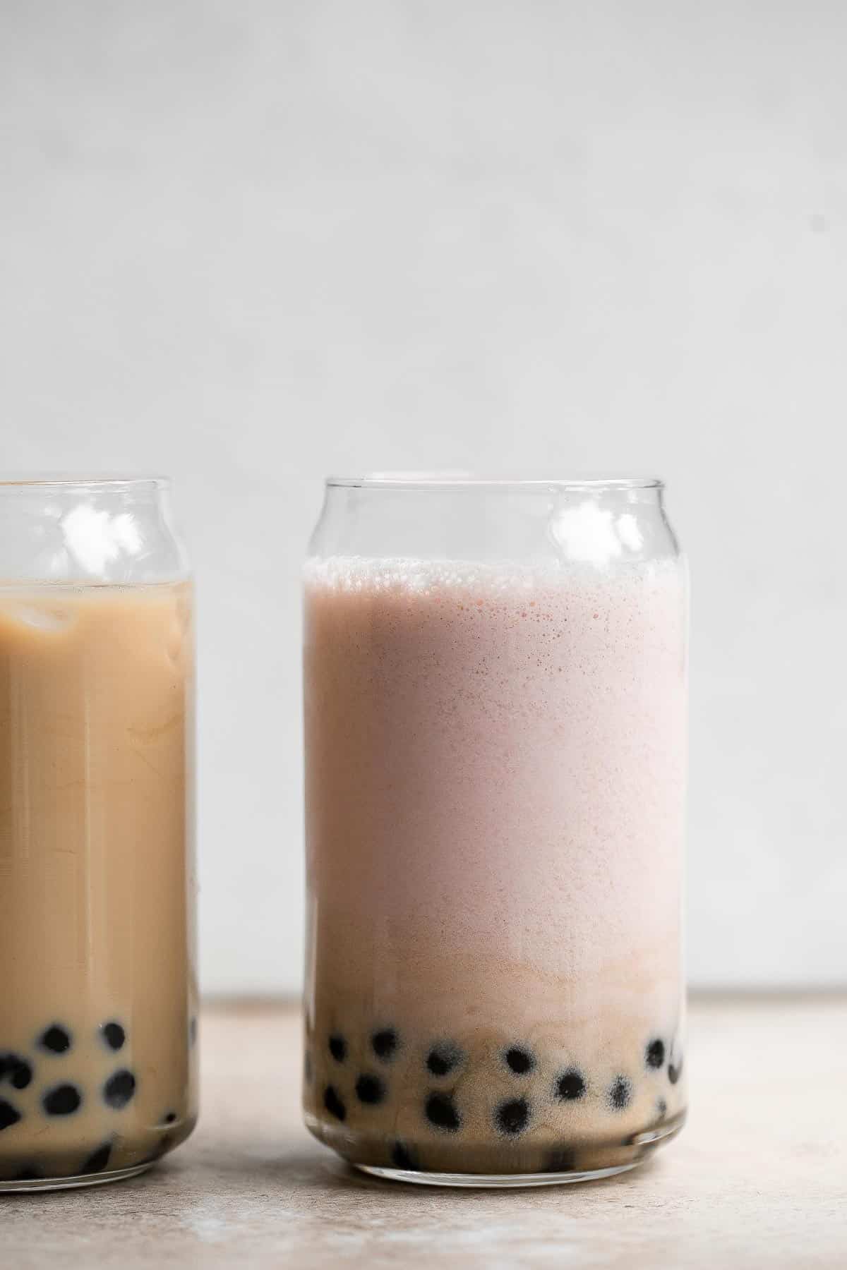 Refreshing strawberry milk tea with boba tapioca pearls is easy to make at home. Loaded with fresh fruit, homemade bubble tea is better than storebought. | aheadofthyme.com