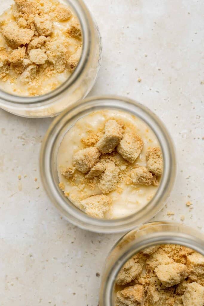 Layer of vanilla wafter cookies in banana pudding parfait. | aheadofthyme.com