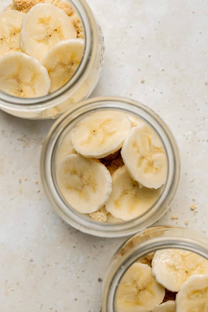 Layer of bananas in banana pudding parfait. | aheadofthyme.com