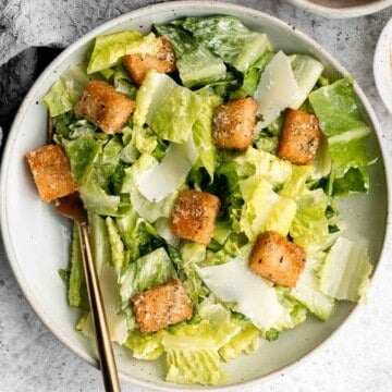 Classic Caesar Salad is fresh, crisp, delicious, and flavorful. With three simple ingredients tossed in a creamy Caesar dressing, it's ready in minutes. | aheadofthyme.com