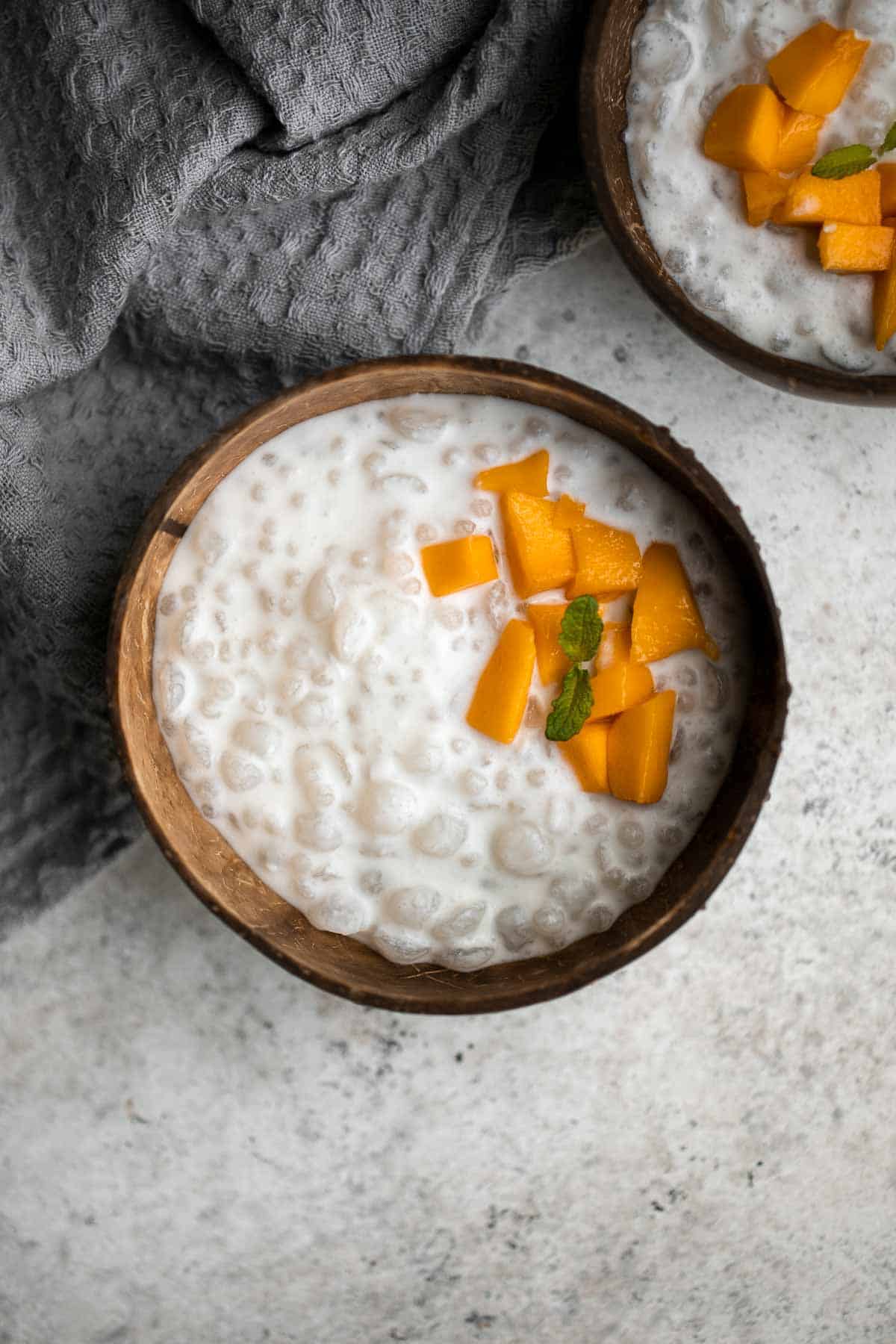 Coconut Tapioca Pudding is a creamy, light, and refreshing Thai dessert to enjoy on a hot summer evening. Plus, it’s gluten-free and can be made vegan too. | aheadofthyme.com