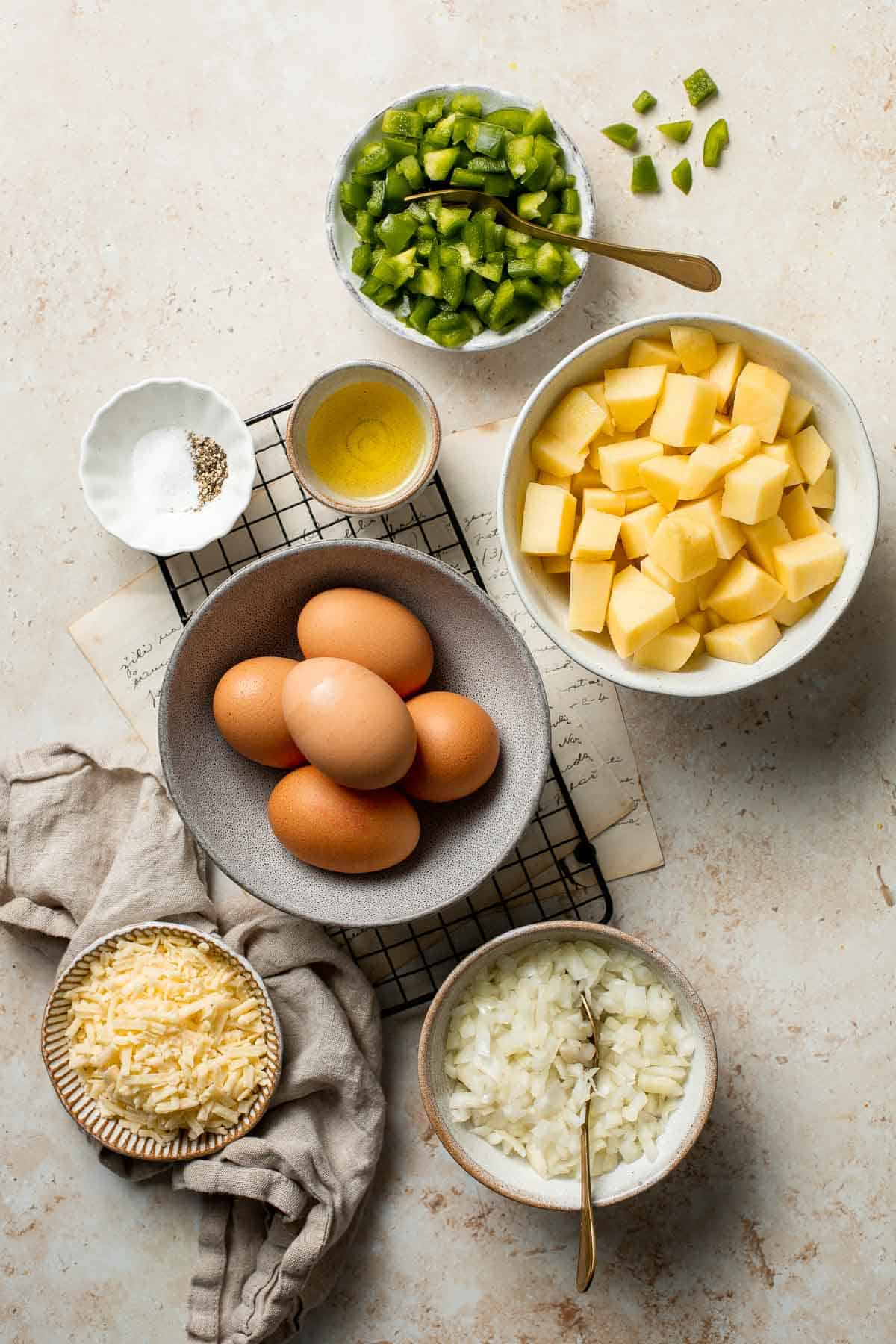 Egg and Potato Breakfast Casserole is an easy vegetarian breakfast bake loaded with veggies. It is completely customizable and can be made ahead of time. | aheadofthyme.com