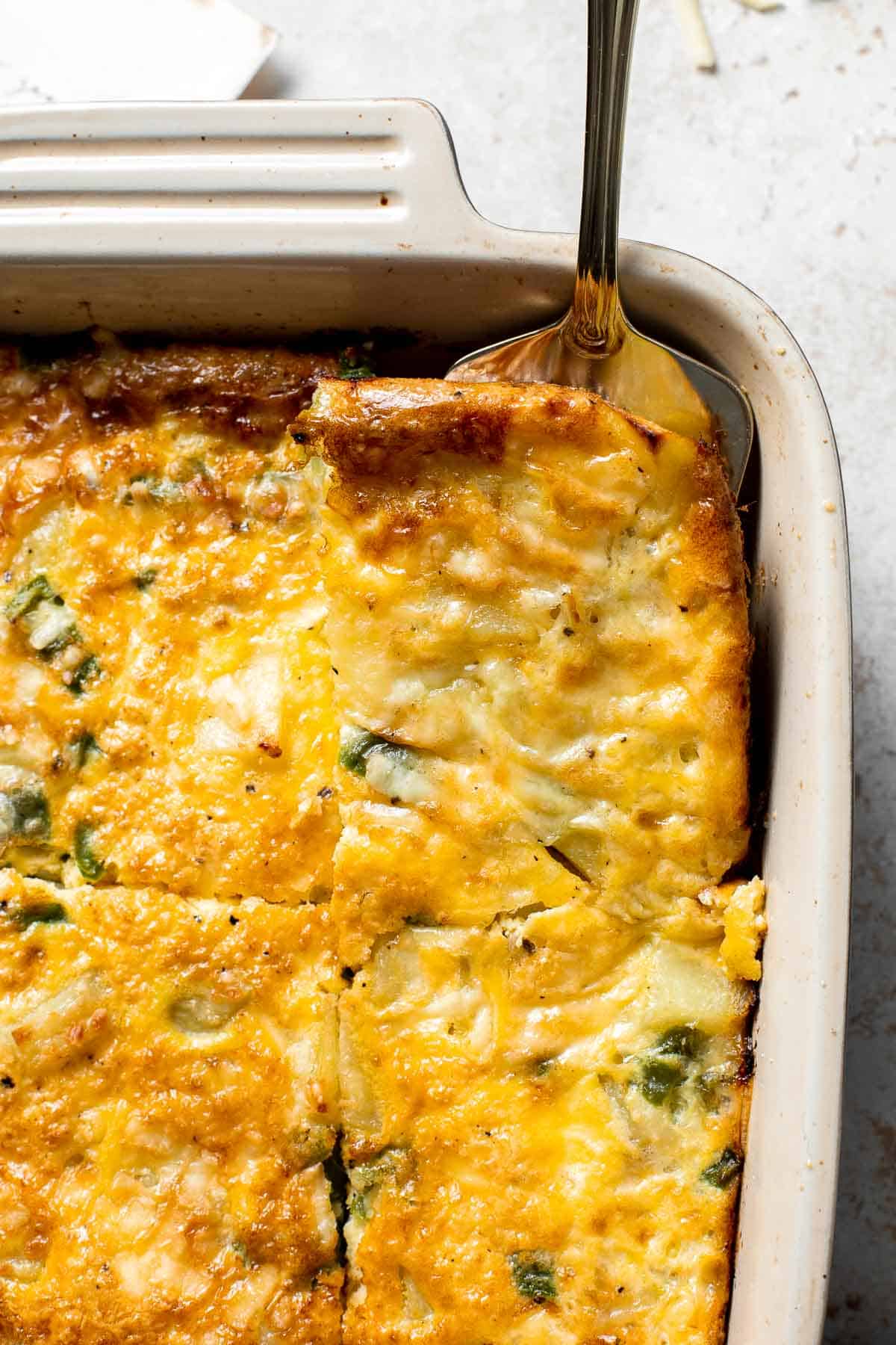 Egg and Potato Breakfast Casserole is an easy vegetarian breakfast bake loaded with veggies. It is completely customizable and can be made ahead of time. | aheadofthyme.com