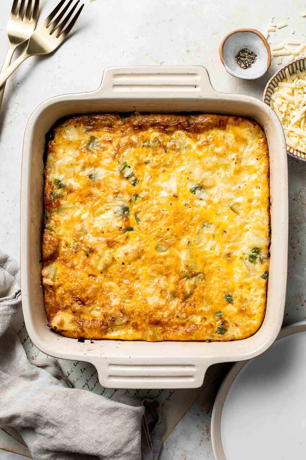 Egg and Potato Breakfast Casserole is an easy vegetarian breakfast bake loaded with veggies. It is completely customizable and can be made ahead of time. | aheadofthyme.com