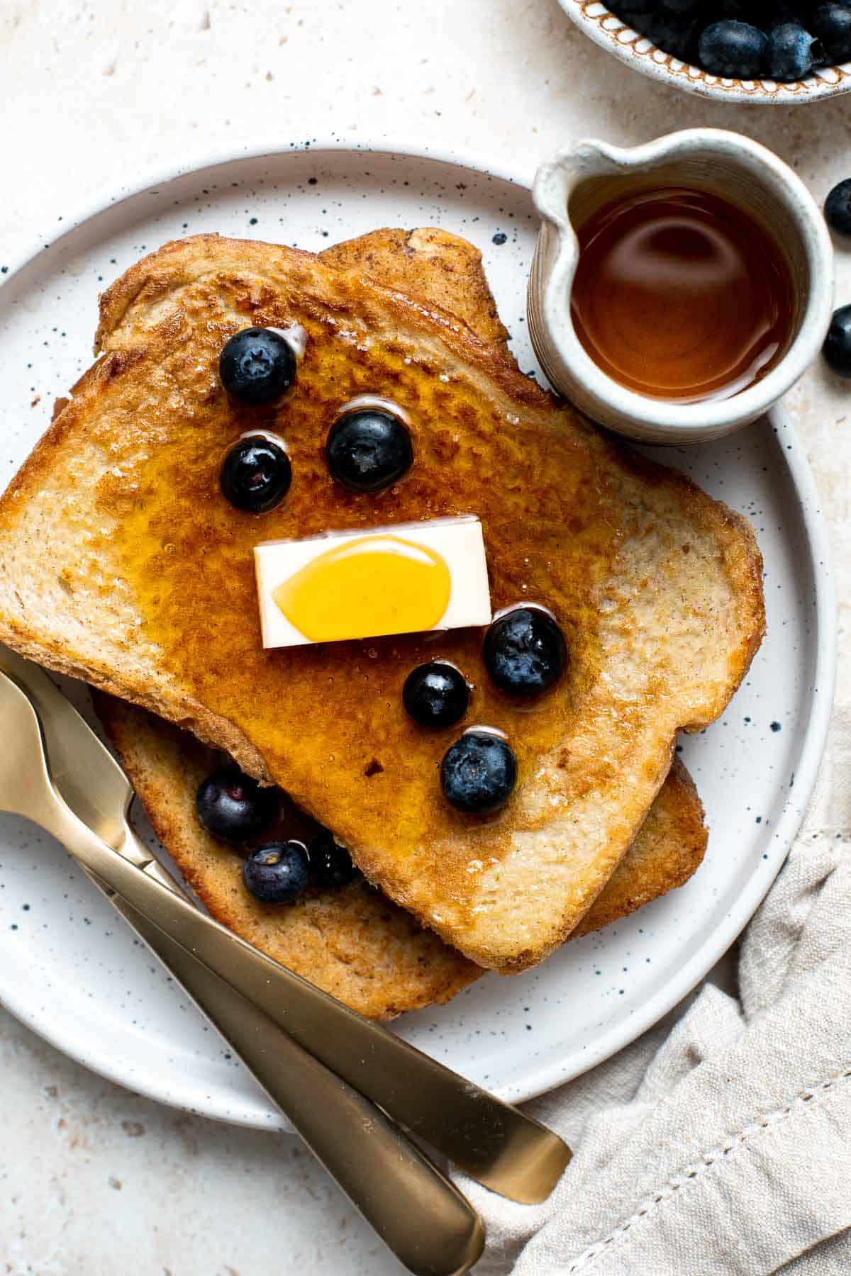 This Classic French Toast is light and fluffy, crisp and browned on the edges, and so delicious. The best part? Breakfast is ready in under 15 minutes. | aheadofthyme.com