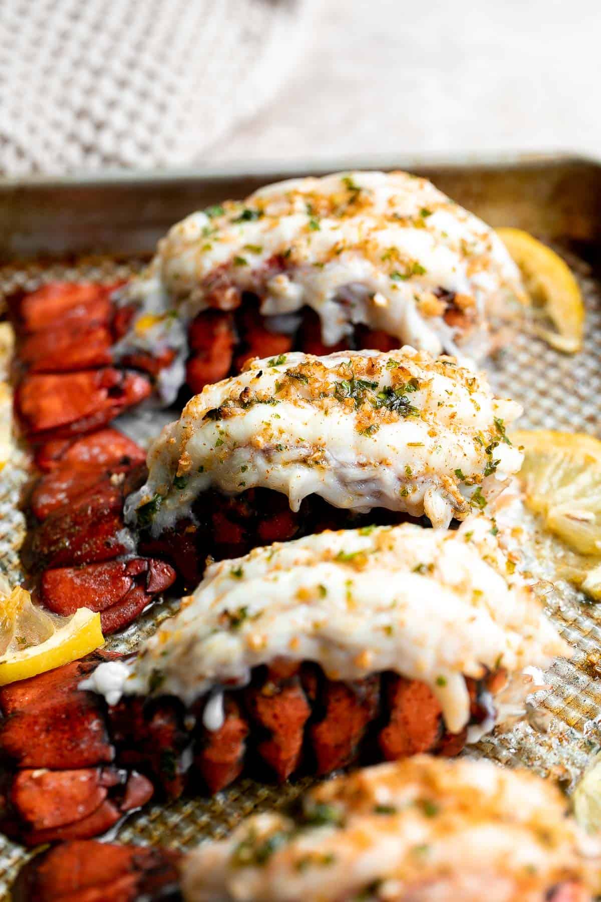 Garlic Butter Lobster Tails are juicy, tender, and flavorful. This quick and easy seafood dinner is ready in less than 20 minutes (including prep!). | aheadofthyme.com