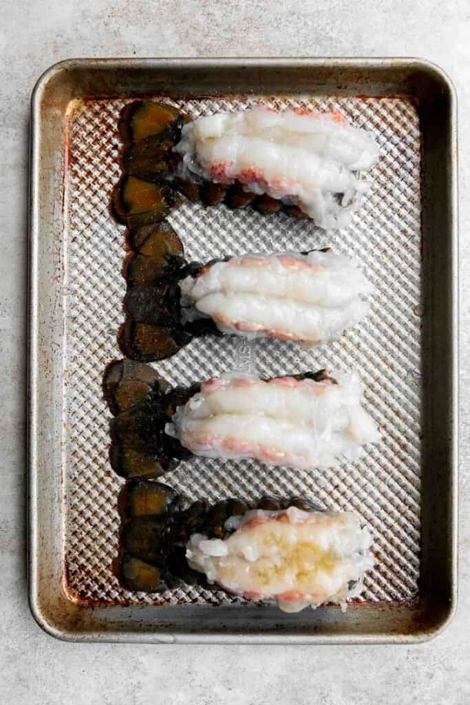 Garlic Butter Lobster Tails are juicy, tender, and flavorful. This quick and easy seafood dinner is ready in less than 20 minutes (including prep!). | aheadofthyme.com