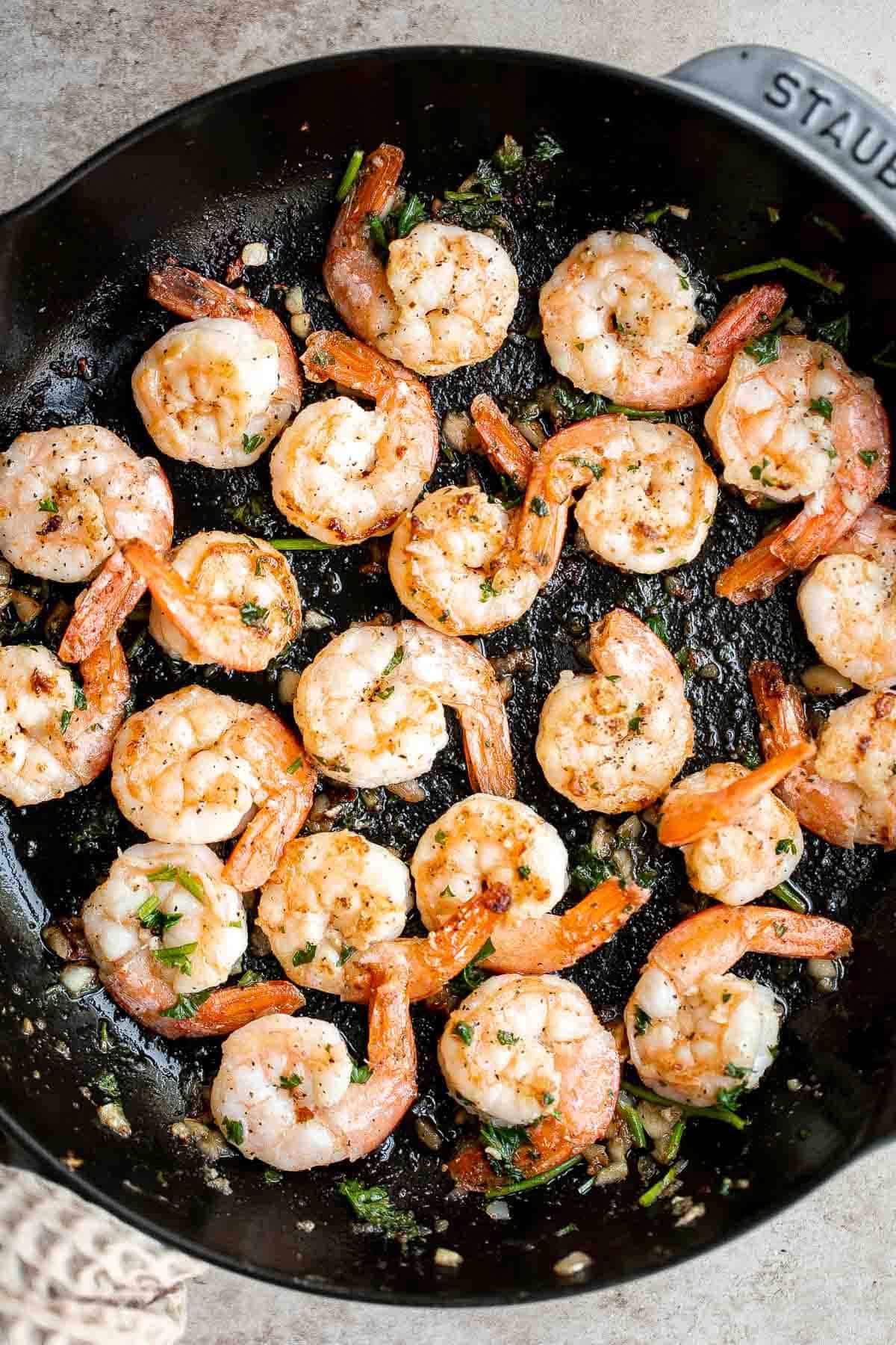 Garlic butter shrimp is a quick and easy dinner ready in just 10 minutes! It’s loaded with flavor and perfect for busy weeknights and special occasions. | aheadofthyme.com