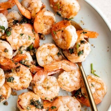 Garlic butter shrimp is a quick and easy dinner ready in just 10 minutes! It’s loaded with flavor and perfect for busy weeknights and special occasions. | aheadofthyme.com