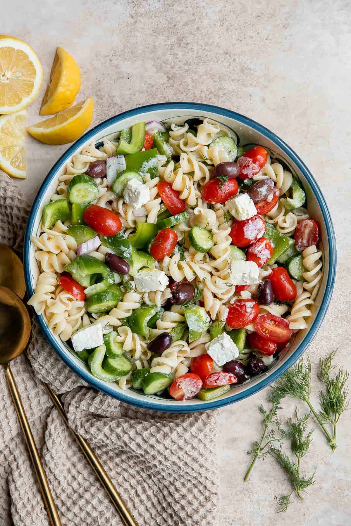 Greek Pasta Salad is quick and easy, loaded with Mediterranean flavors, and delicious. Serve it at a summer cookout or potluck, or meal prep weekly lunches. | aheadofthyme.com