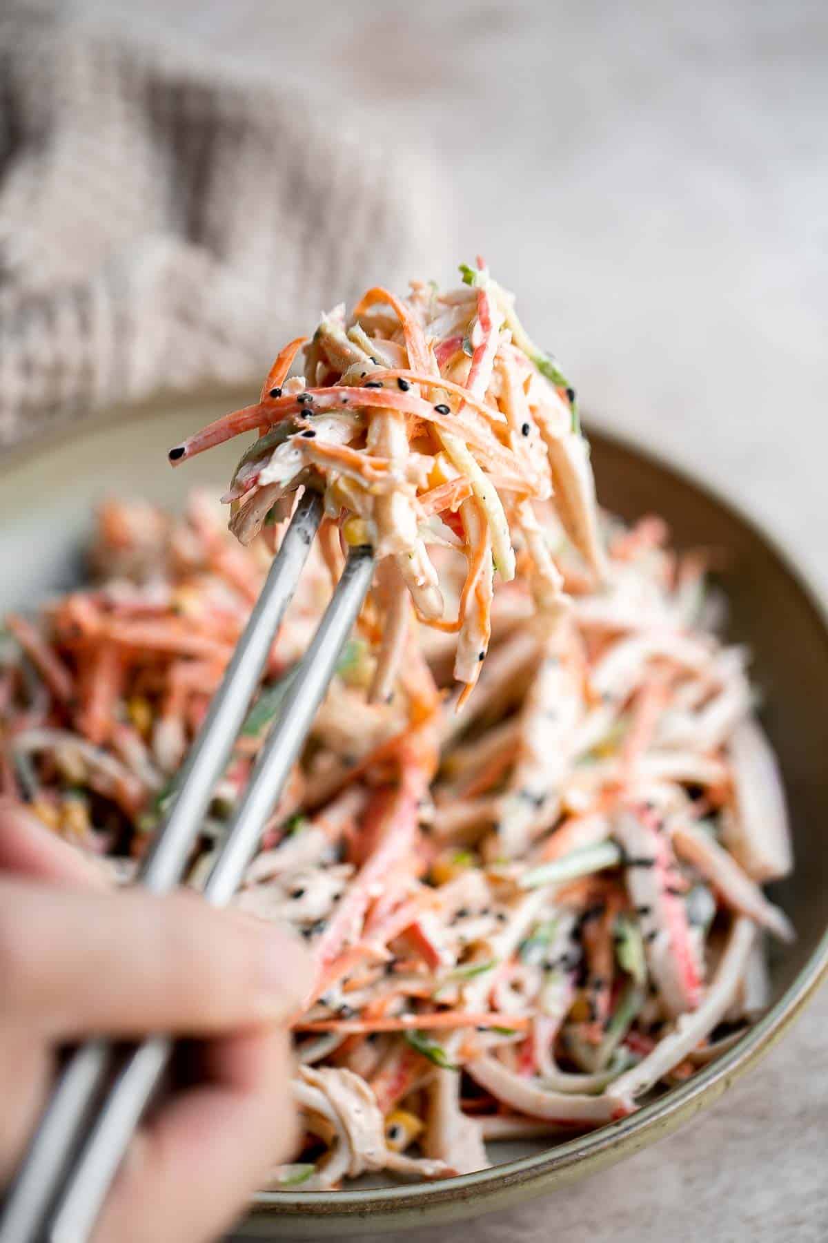 Kani Salad is loaded with thin strips of crab, julienned vegetables, and a creamy mayo dressing (which can be made spicy for a Spicy Kani Salad). | aheadofthyme.com