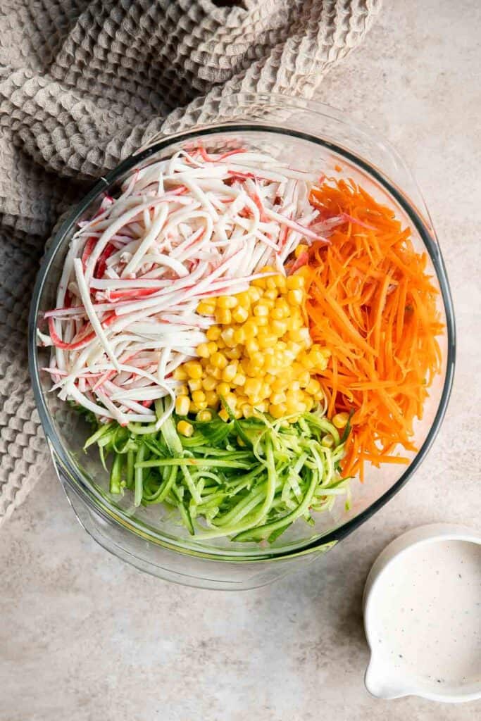 Kani Salad is loaded with thin strips of crab, julienned vegetables, and a creamy mayo dressing (which can be made spicy for a Spicy Kani Salad). | aheadofthyme.com