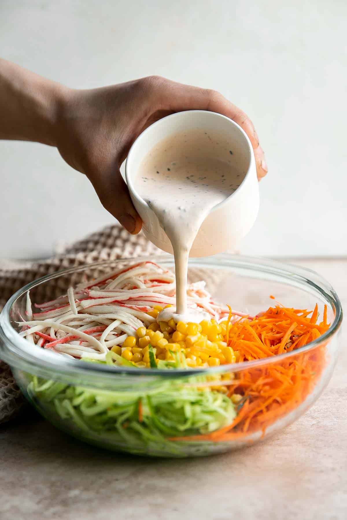 Kani Salad is loaded with thin strips of crab, julienned vegetables, and a creamy mayo dressing (which can be made spicy for a Spicy Kani Salad). | aheadofthyme.com
