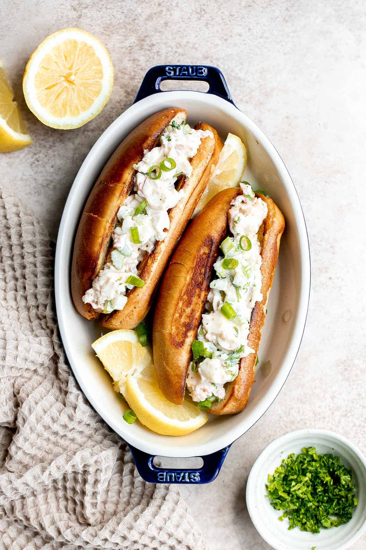 New England Lobster Rolls are a classic sandwich loaded with fresh lobster meat. Make them in just 10 minutes and serve them all summer long. | aheadofthyme.com