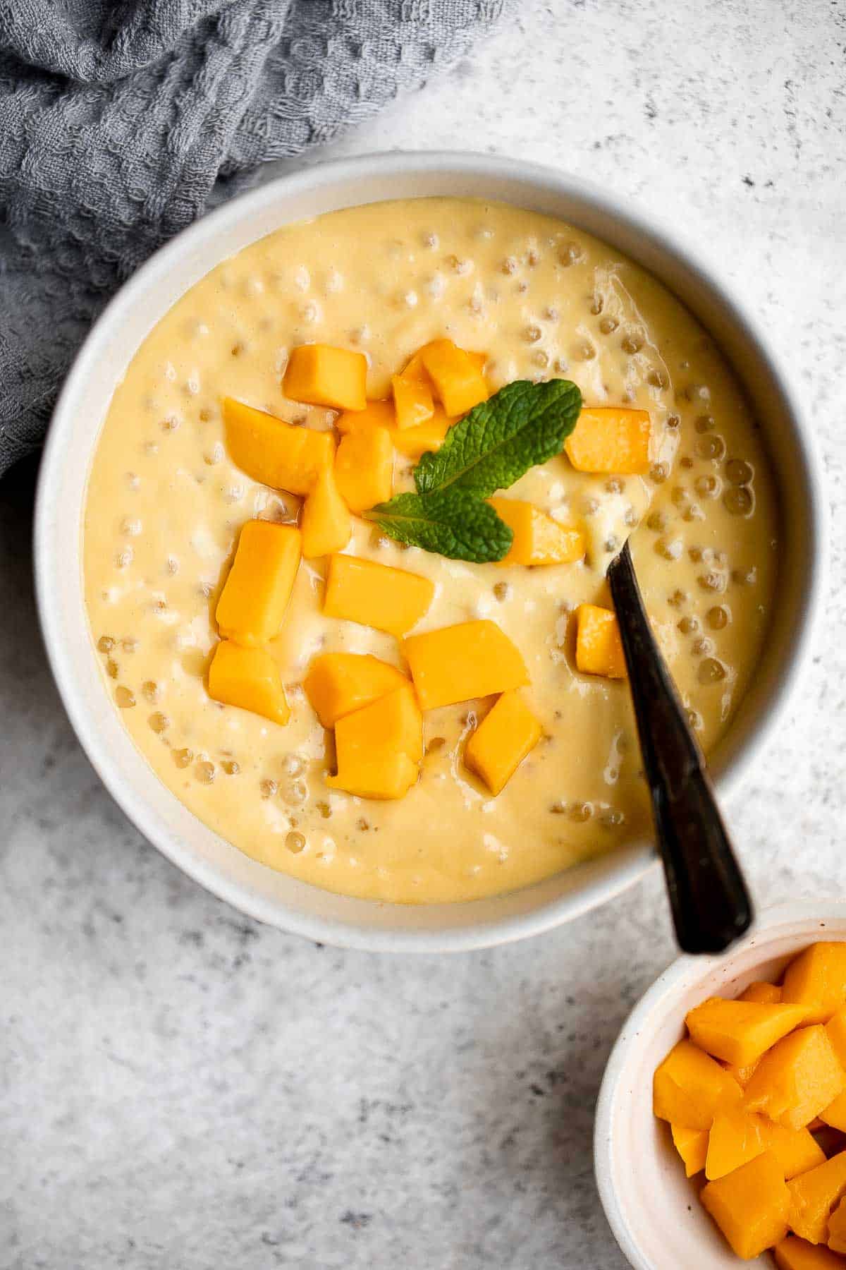 Mango sago is a popular Asian dessert that’s creamy, fruity, cold tapioca pudding dessert is easy to make at home with just a few simple ingredients. | aheadofthyme.com