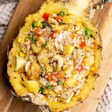 Pineapple fried rice is a quick and easy meal that is ready in just 20 minutes. It's a savory, sweet, delicious, and flavorful weeknight family dinner. | aheadofthyme.com