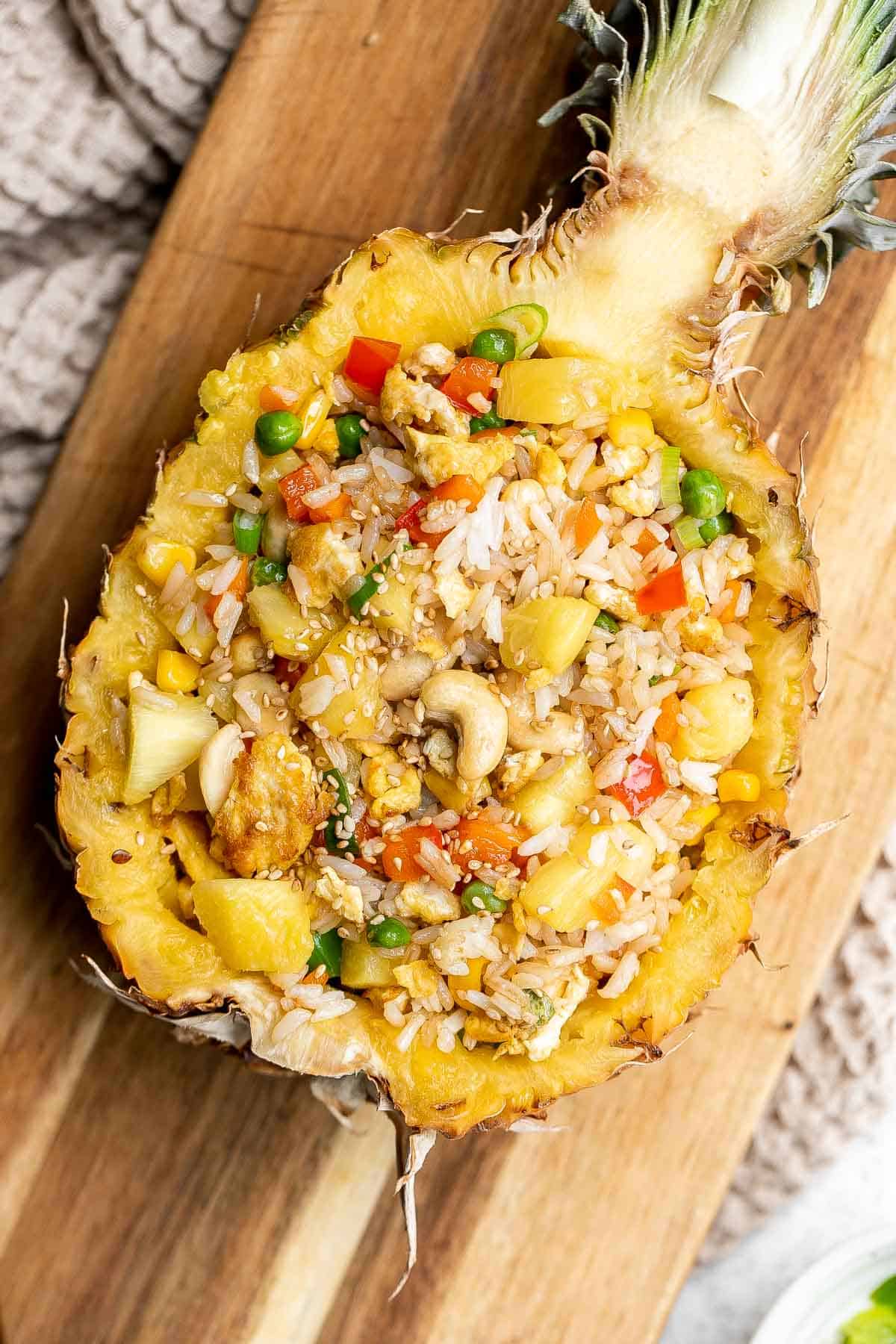 Pineapple fried rice is a quick and easy meal that is ready in just 20 minutes. It's a savory, sweet, delicious, and flavorful weeknight family dinner. | aheadofthyme.com