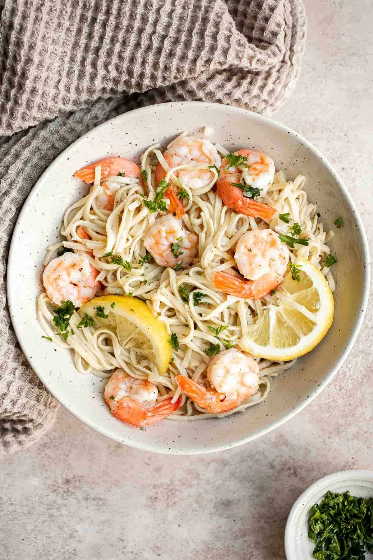 Shrimp scampi is a delicious American-Italian dish made with tender shrimp and a flavorful buttery sauce that is quick and easy to make in 15 minutes. | aheadofthyme.com