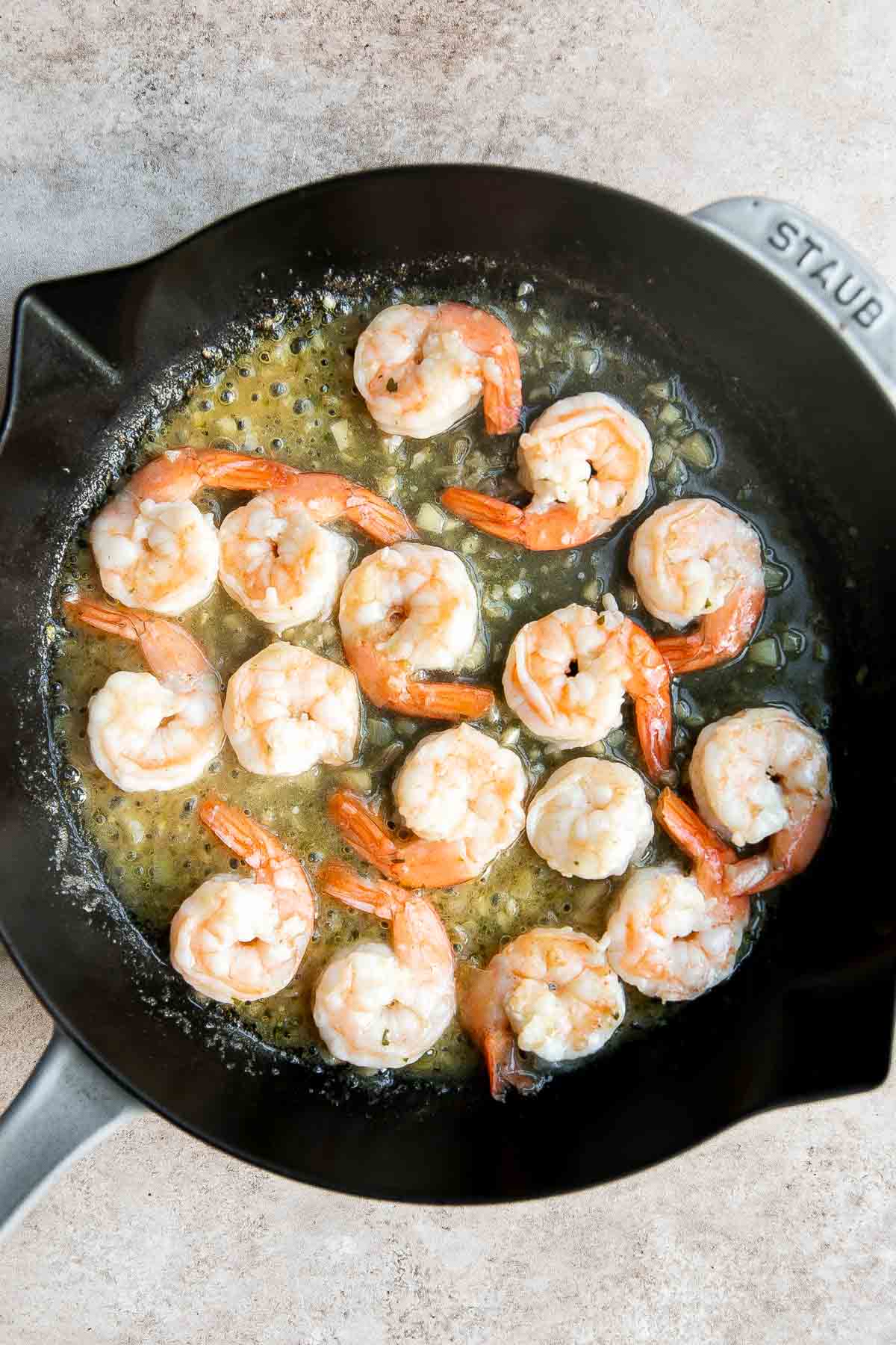 Shrimp scampi is a delicious American-Italian dish made with tender shrimp and a flavorful buttery sauce that is quick and easy to make in 15 minutes. | aheadofthyme.com