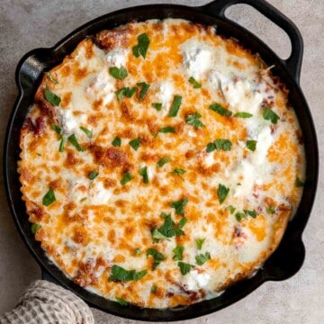 This one pan Skillet Lasagna has all the same ingredients and flavors as a traditional meat lasagna but with minimal prep and is ready in just 40 minutes. | aheadofthyme.com
