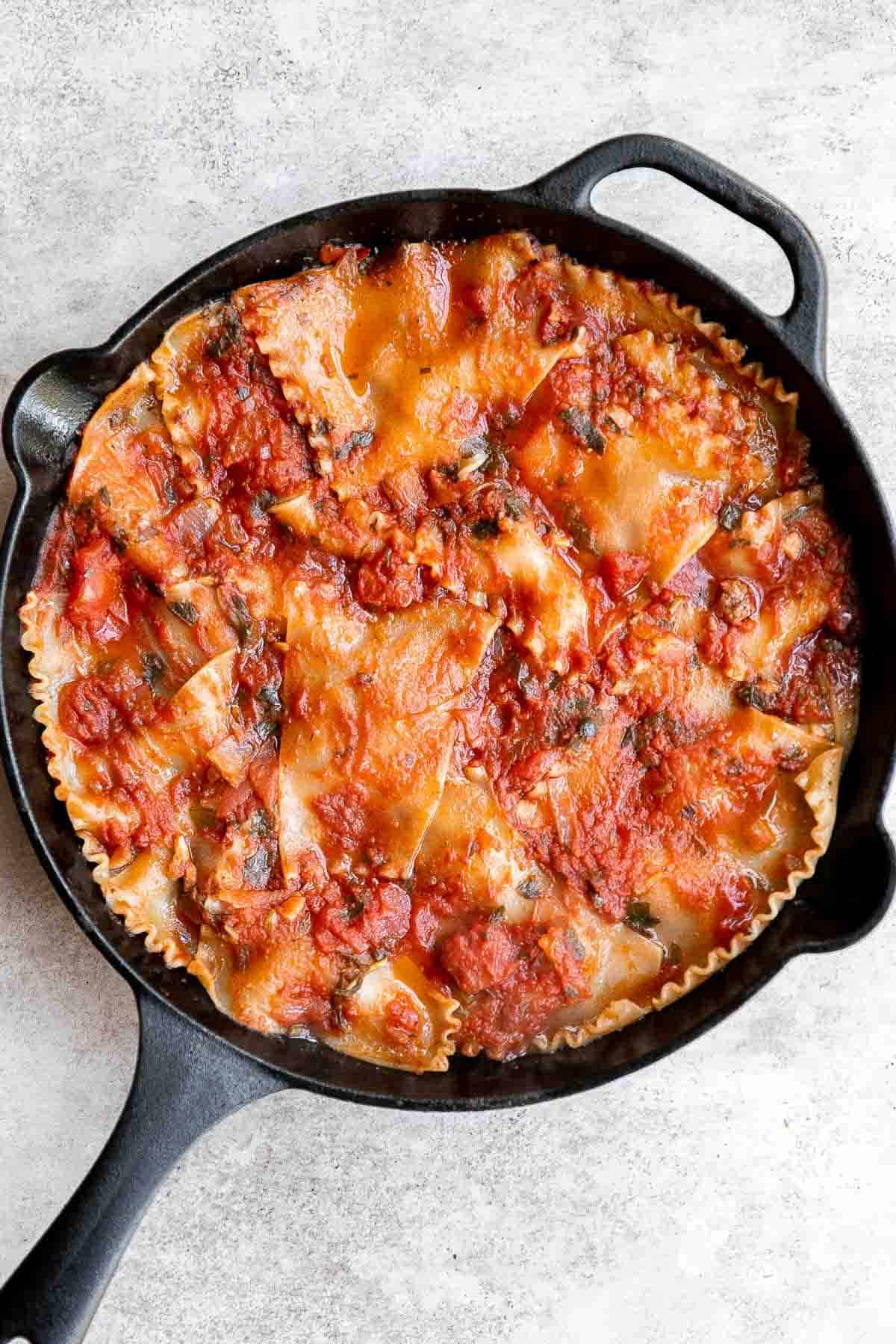 This one pan Skillet Lasagna has all the same ingredients and flavors as a traditional meat lasagna but with minimal prep and is ready in just 40 minutes. | aheadofthyme.com