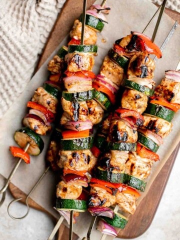 Grilled Balsamic Chicken Kabobs are a delicious flavorful summer grill staple marinated in a balsamic sauce, skewered with vegetables, and grilled or baked. | aheadofthyme.com