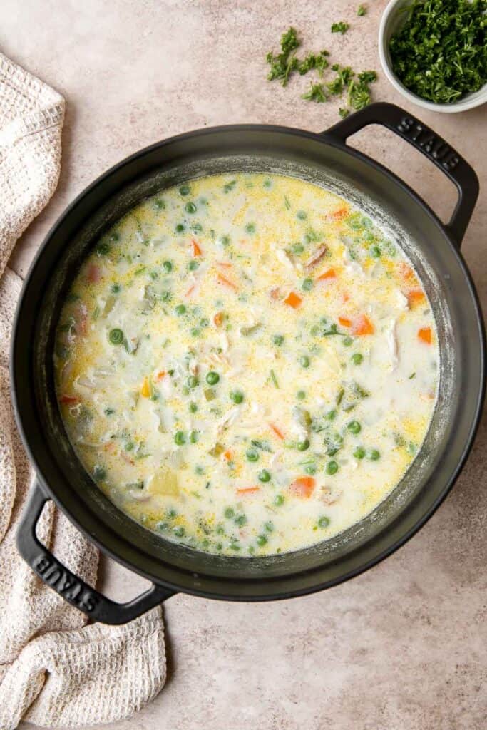 Chicken Pot Pie Soup has all the classic flavors of chicken pot pie, but in a hearty soup form with tender chicken, veggies, and a rich creamy broth. | aheadofthyme.com