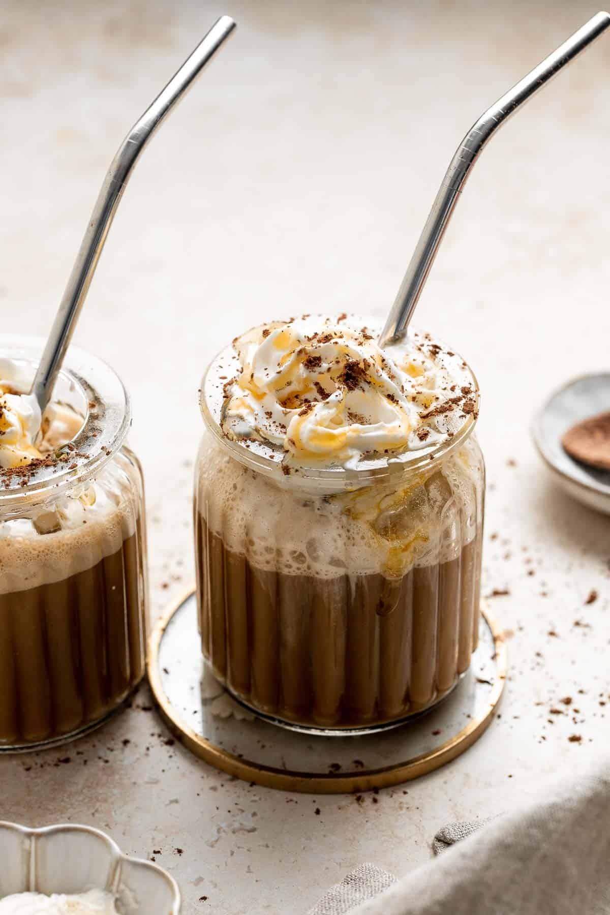 This Starbucks copycat Frappuccino recipe is icy, frothy, sweet, and milky. It’s faster and cheaper than the store-bought version and tastes just as good! | aheadofthyme.com