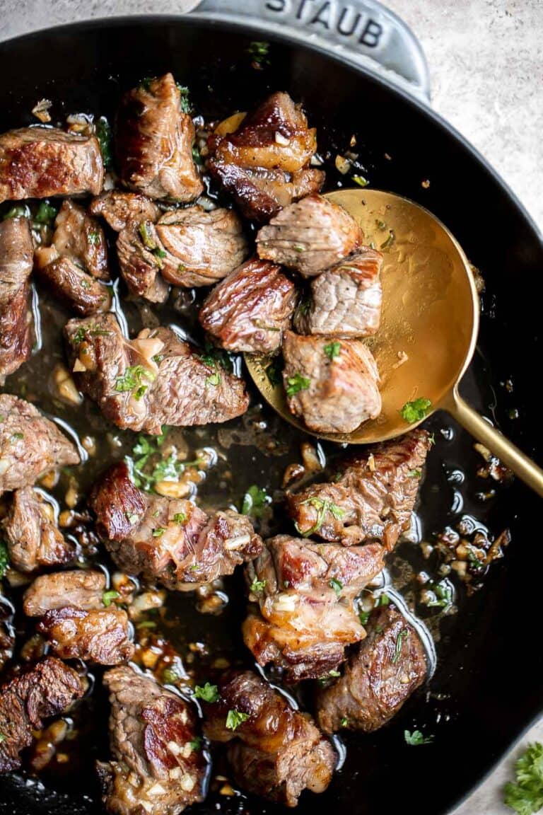 Garlic Butter Steak Bites are tender, juicy, and flavorful. This quick and easy appetizer or weeknight dinner takes just 15 minutes to make in one skillet. | aheadofthyme.com