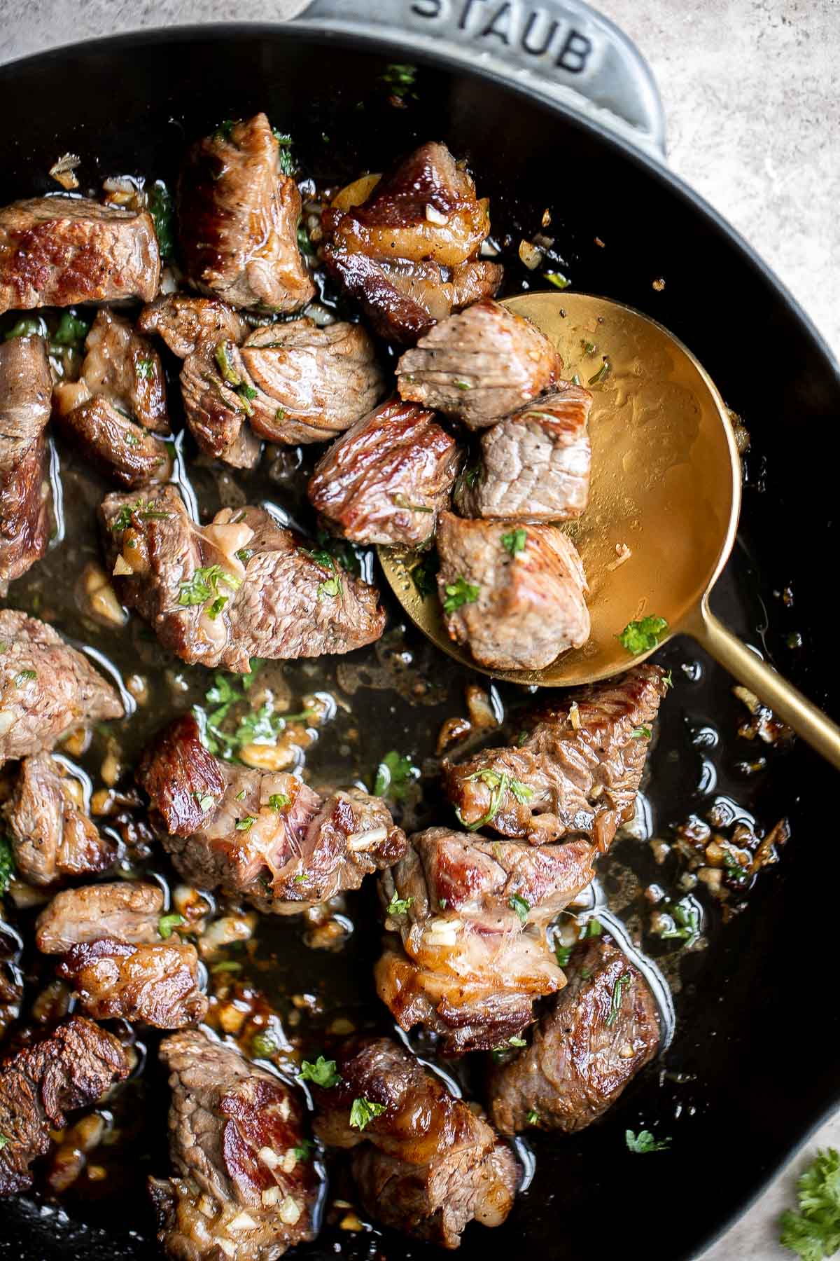 Garlic Butter Steak Bites are tender, juicy, and flavorful. This quick and easy appetizer or weeknight dinner takes just 15 minutes to make in one skillet. | aheadofthyme.com