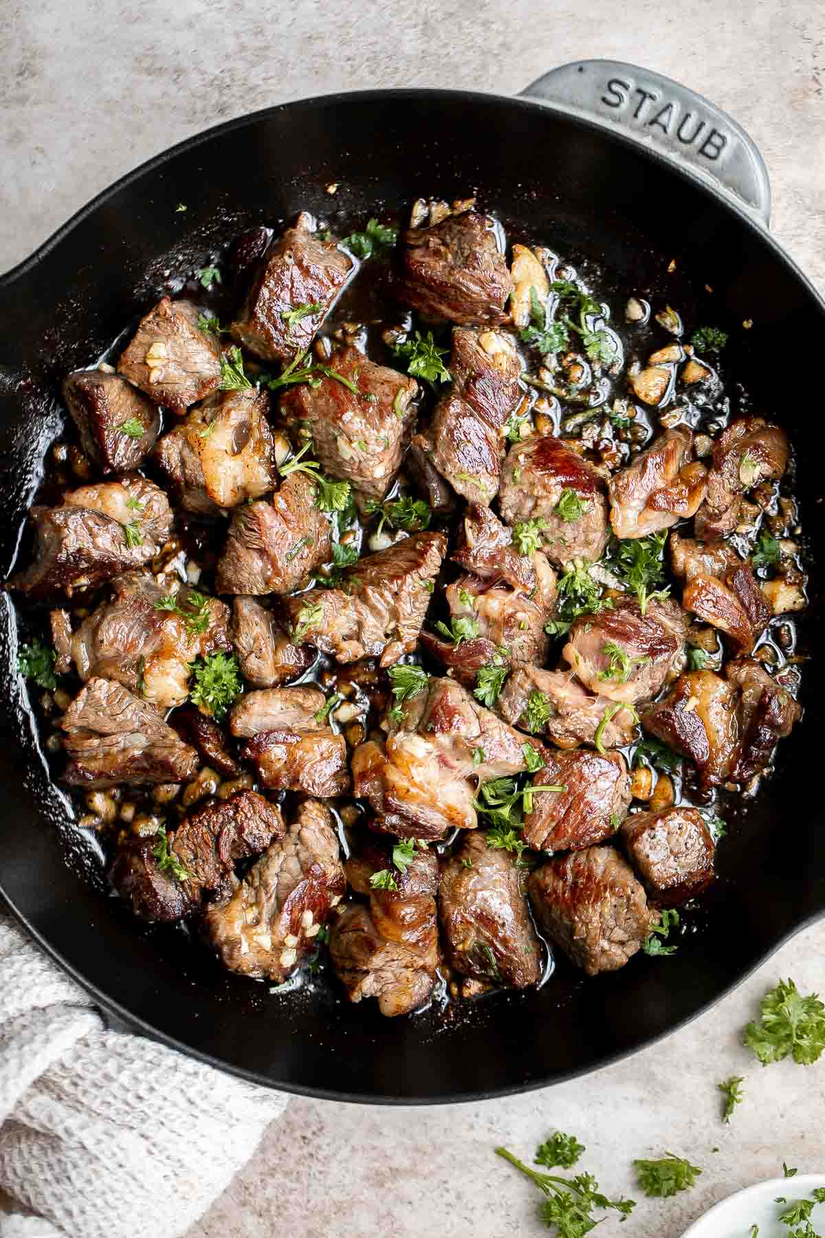 Garlic Butter Steak Bites are tender, juicy, and flavorful. This quick and easy appetizer or weeknight dinner takes just 15 minutes to make in one skillet. | aheadofthyme.com