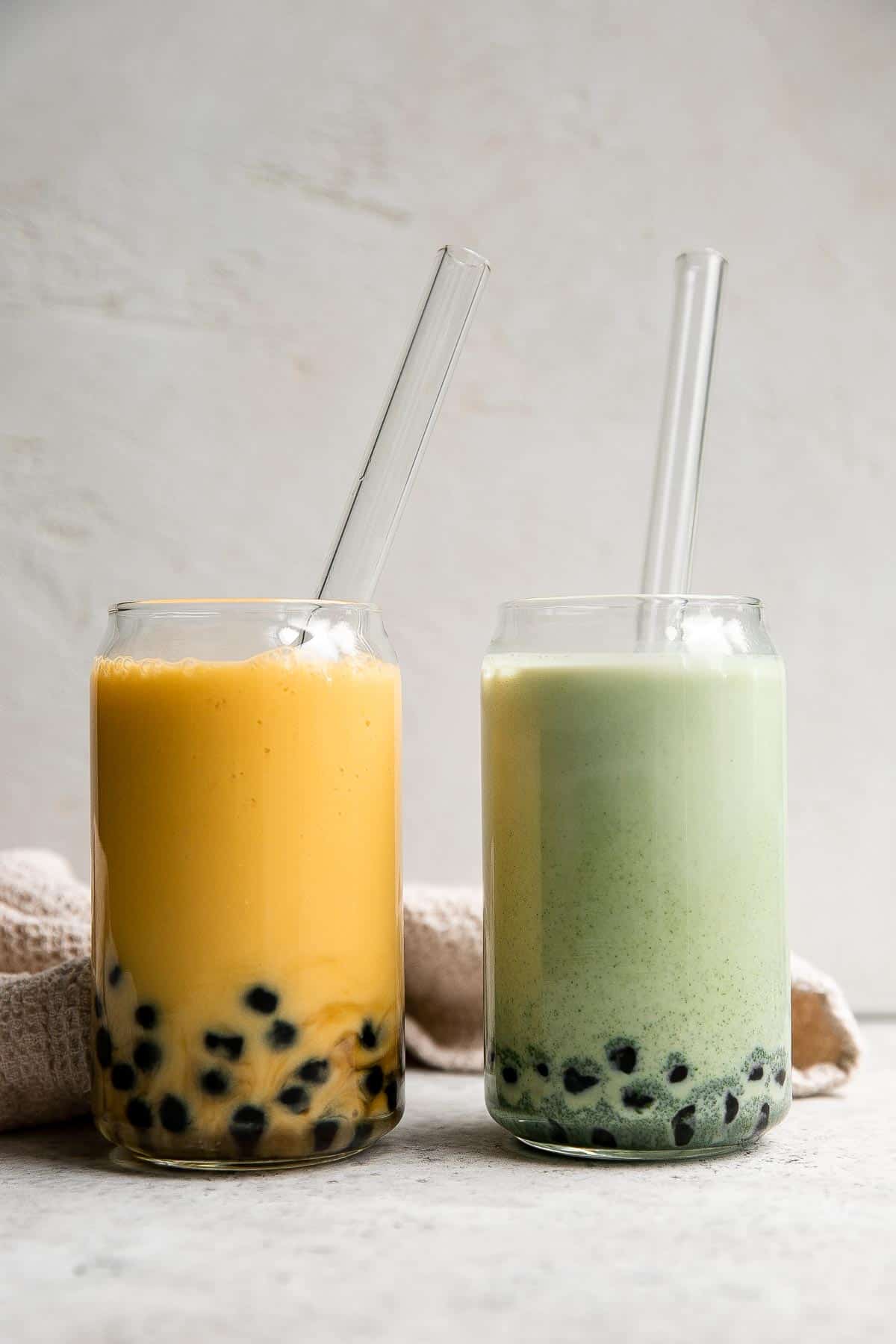 Mango Bubble Tea with boba tapioca pearls is the perfect creamy and refreshing summer drink. You won’t believe how easy and cheaper it is to make at home! | aheadofthyme.com