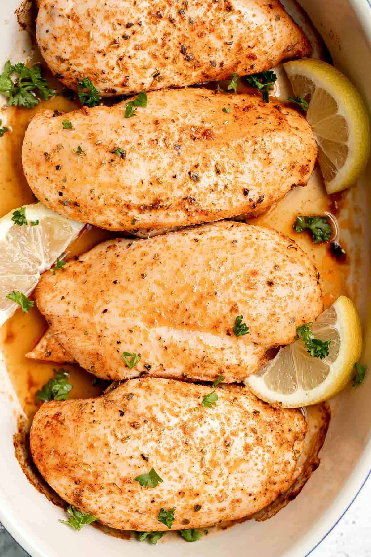 This Oven Baked Chicken Breast is juicy, tender, and delicious. It’s quick and easy to make with a simple seasoning blend that packs on the flavor. | aheadofthyme.com