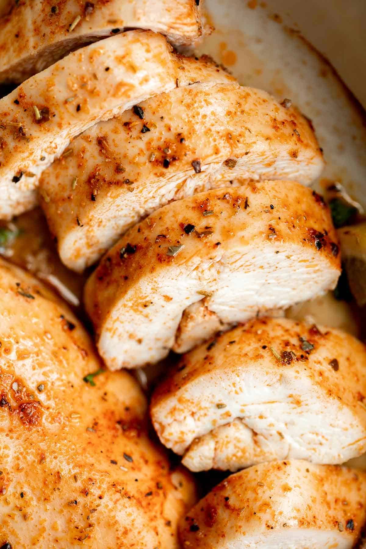 This Oven Baked Chicken Breast is juicy, tender, and delicious. It’s quick and easy to make with a simple seasoning blend that packs on the flavor. | aheadofthyme.com