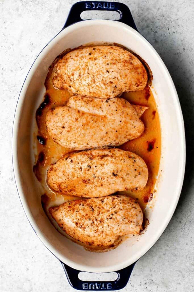 This Oven Baked Chicken Breast is juicy, tender, and delicious. It’s quick and easy to make with a simple seasoning blend that packs on the flavor. | aheadofthyme.com