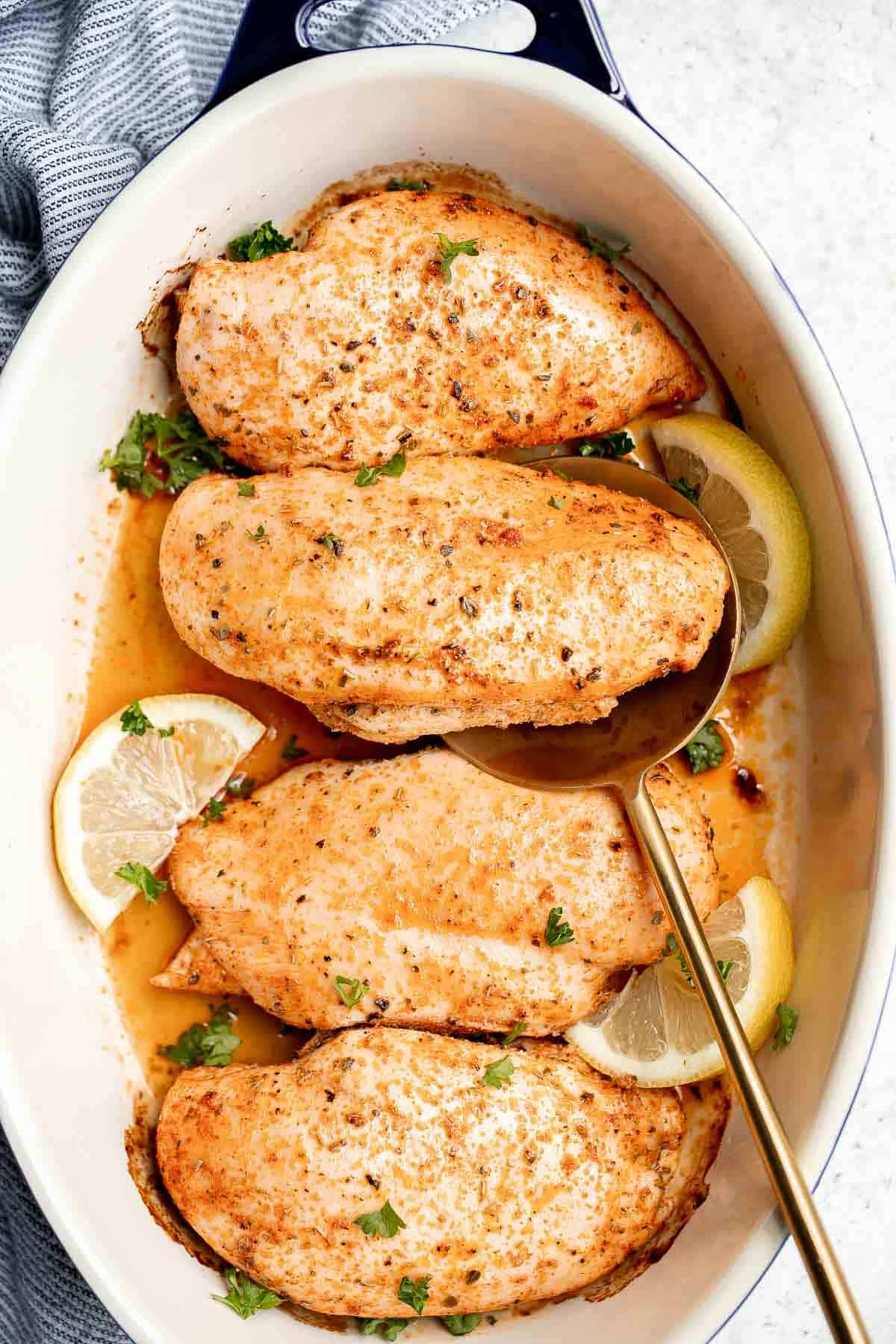 This Oven Baked Chicken Breast is juicy, tender, and delicious. It’s quick and easy to make with a simple seasoning blend that packs on the flavor. | aheadofthyme.com