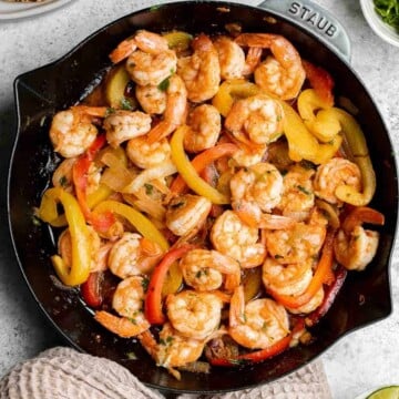 Shrimp fajitas are healthy, flavorful, and delicious. This one skillet recipe is loaded with shrimp and vegetables and is ready in just 20 minutes. | aheadofthyme.com