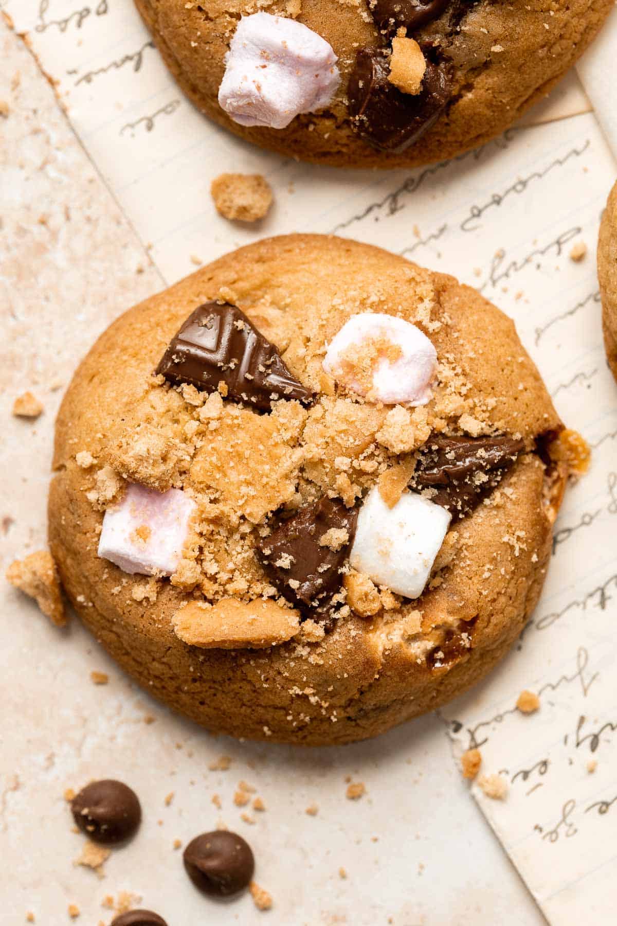 S'mores Cookies are chewy, gooey, and nostalgic, loaded with marshmallows, chocolate, and Graham crackers — and no campfire required. Quick and easy too! | aheadofthyme.com