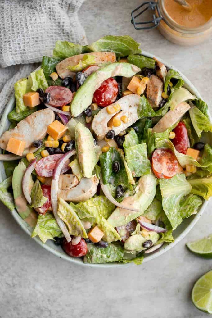 Southwest Salad is a delicious and hearty salad that is loaded with classic southwestern flavors with a Tex-Mex twist, tossed in a homemade salad dressing. | aheadofthyme.com