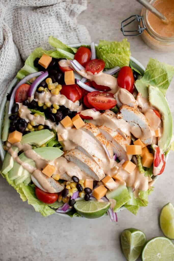 Southwest Salad is a delicious and hearty salad that is loaded with classic southwestern flavors with a Tex-Mex twist, tossed in a homemade salad dressing. | aheadofthyme.com