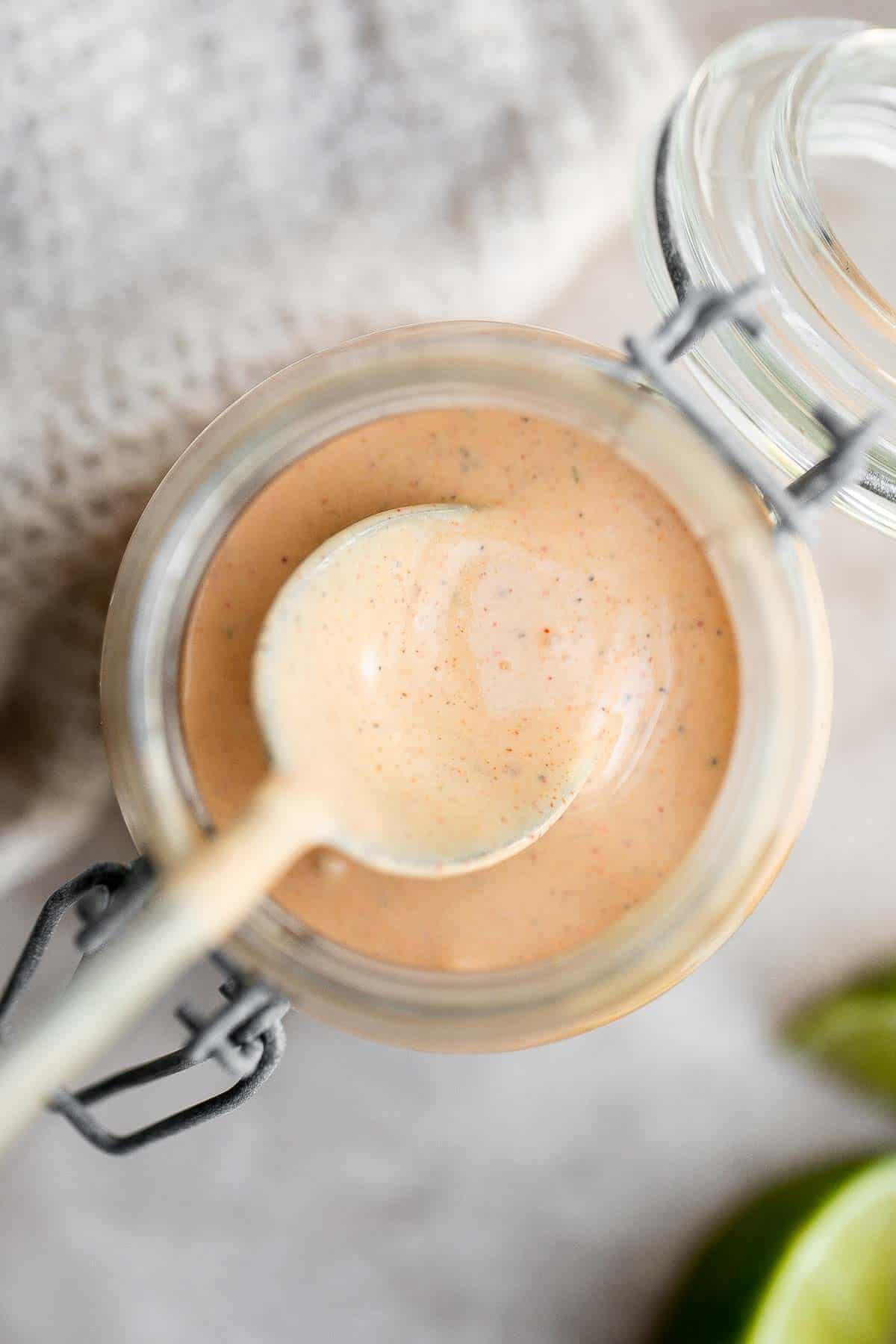 Homemade Southwest Salad Dressing is creamy and flavorful with a little spicy kick. This quick and easy yogurt-based dressing is ready in just minutes. | aheadofthyme.com