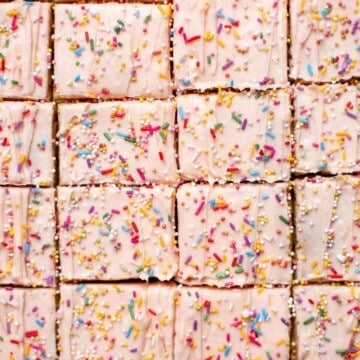 Sugar Cookie Bars are soft and chewy with homemade buttercream frosting on top. They're the easiest way to make sugar cookies with no cookie cutters! | aheadofthyme.com