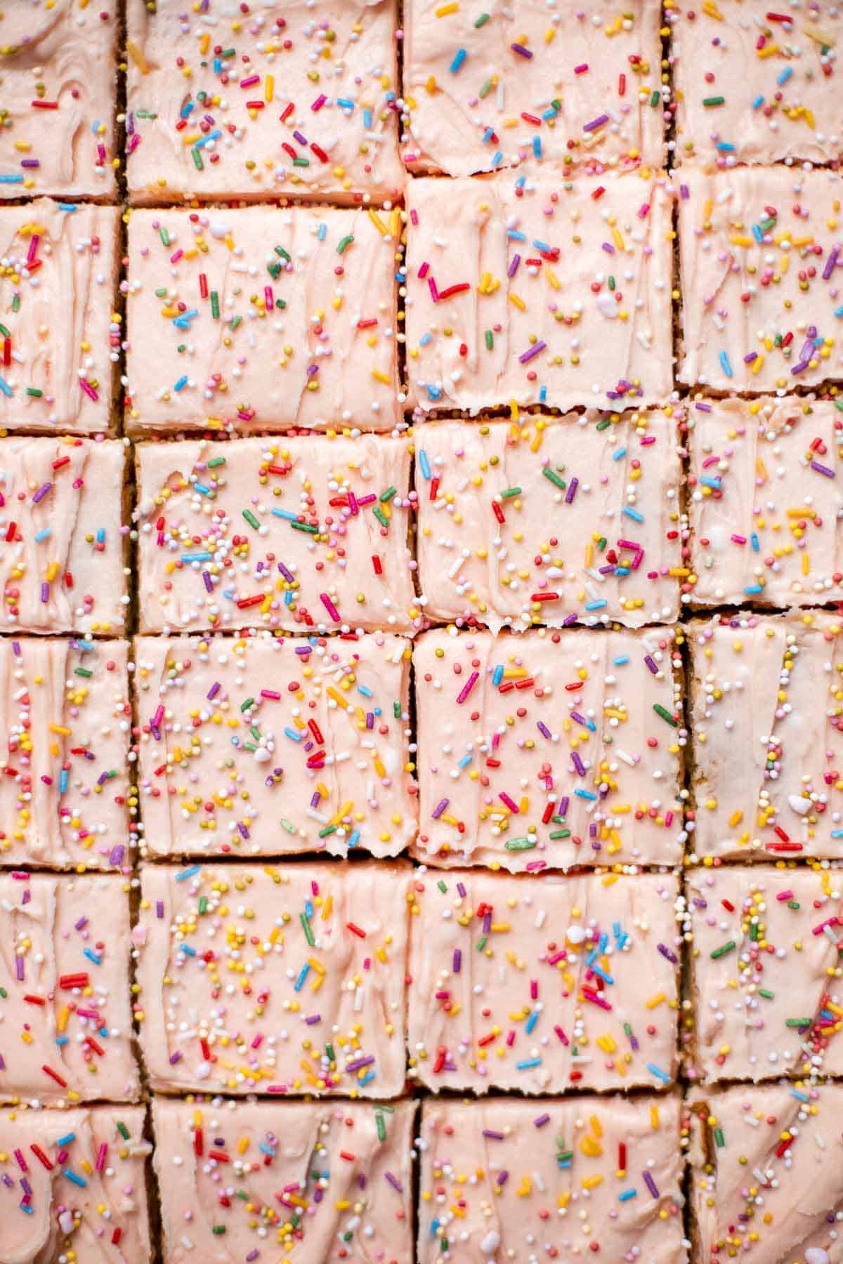 Sugar Cookie Bars are soft and chewy with homemade buttercream frosting on top. They're the easiest way to make sugar cookies with no cookie cutters! | aheadofthyme.com