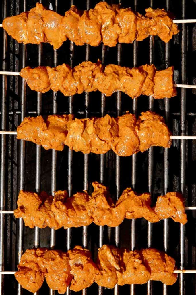 Tandoori Chicken Skewers with juicy tender chicken bites are marinated in an authentic yogurt marinade packed with a homemade Indian seasoning blend. | aheadofthyme.com