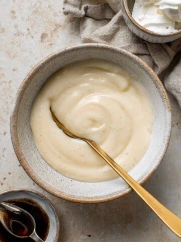 Homemade vanilla pudding is a creamy no bake dessert that you can make with 7 simple ingredients. So much better than boxed pudding mixes or pudding cups. | aheadofthyme.com