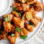 Air Fryer Tandoori Chicken Bites are juicy, tender, and loaded with authentic Indian spices. This quick easy air fryer recipe is perfect on busy weeknights. | aheadofthyme.com