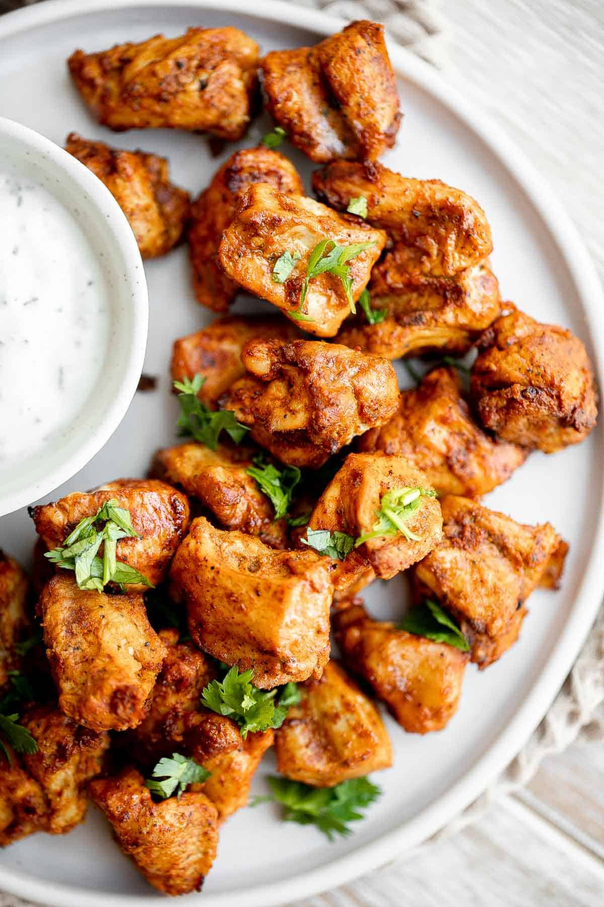 Air Fryer Tandoori Chicken Bites are juicy, tender, and loaded with authentic Indian spices. This quick easy air fryer recipe is perfect on busy weeknights. | aheadofthyme.com